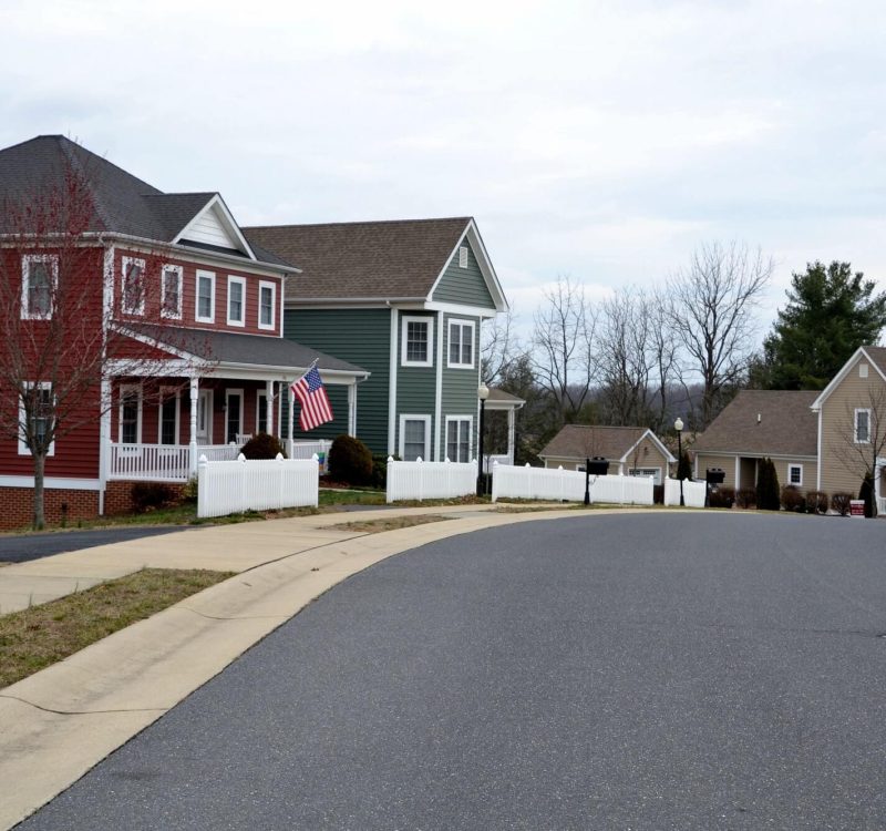 a-street-of-modern-homes-houses-in-various-colors-to-make-a-cozy-neighborhood-of-prime-real-estate-1.jpg